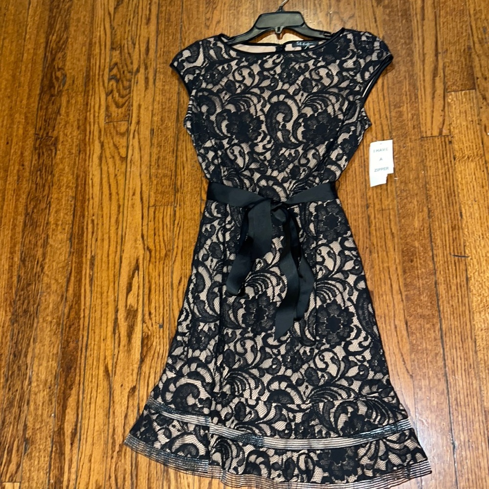 New never wore black lace dress with nude lining white belt.